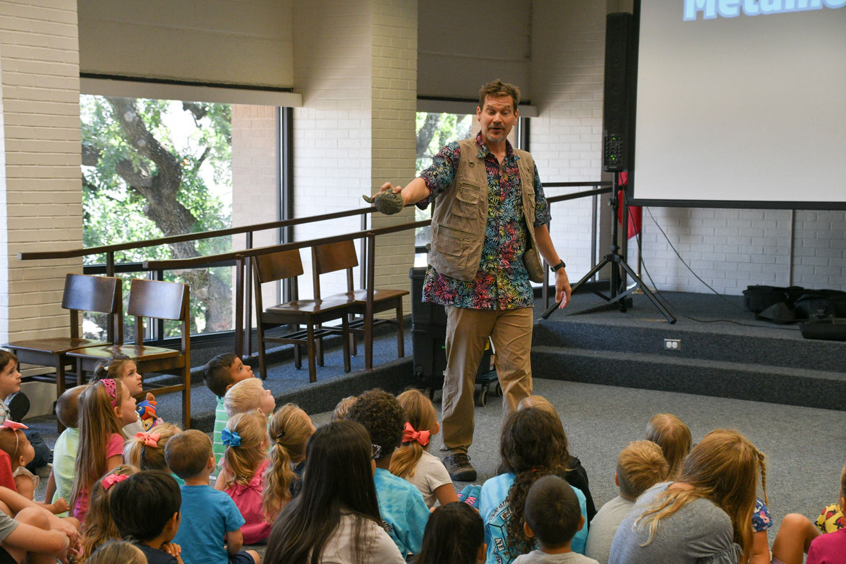 Singing zoologist Lucas Miller visits Bryan library